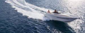 Couple enjoy boating on sleek vessel - Adventure Marine Lifestyle
